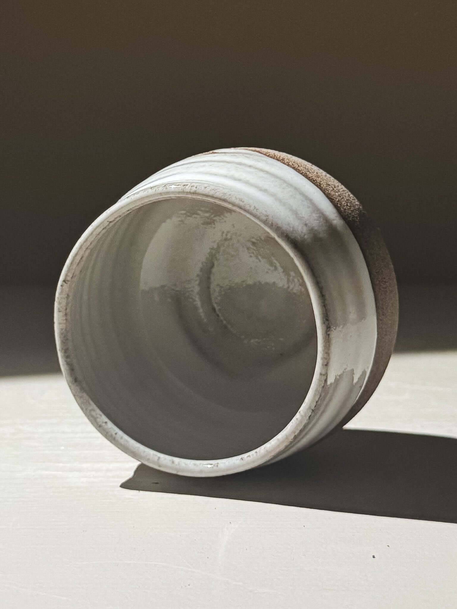 Yunomi Cup - Yuki Ash #03 showcasing glossy white glaze and textured clay, handmade stoneware.