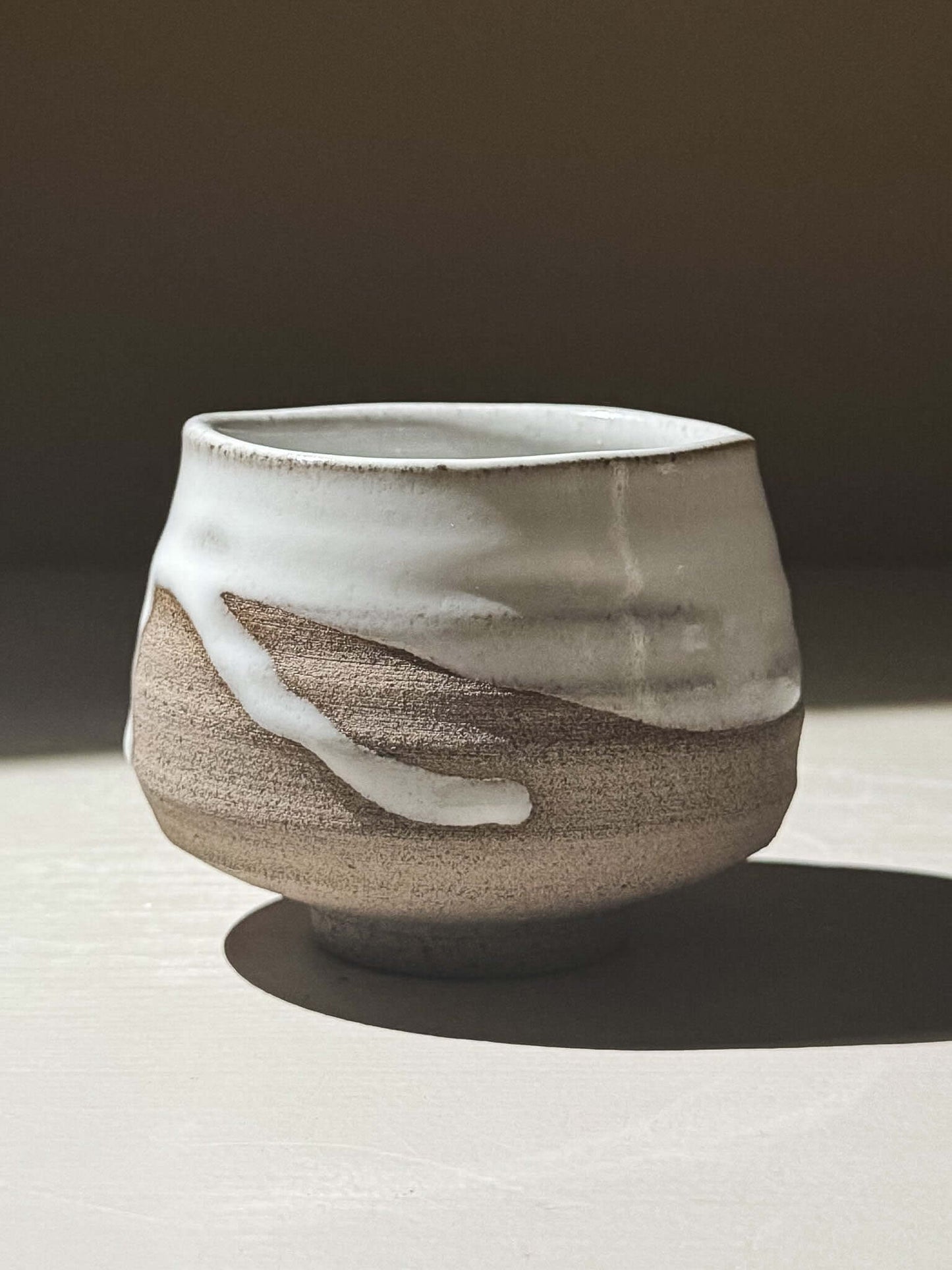 Yunomi Cup - Yuki Ash #02 showcasing soft glossy white glaze over textured ash-grey stoneware.