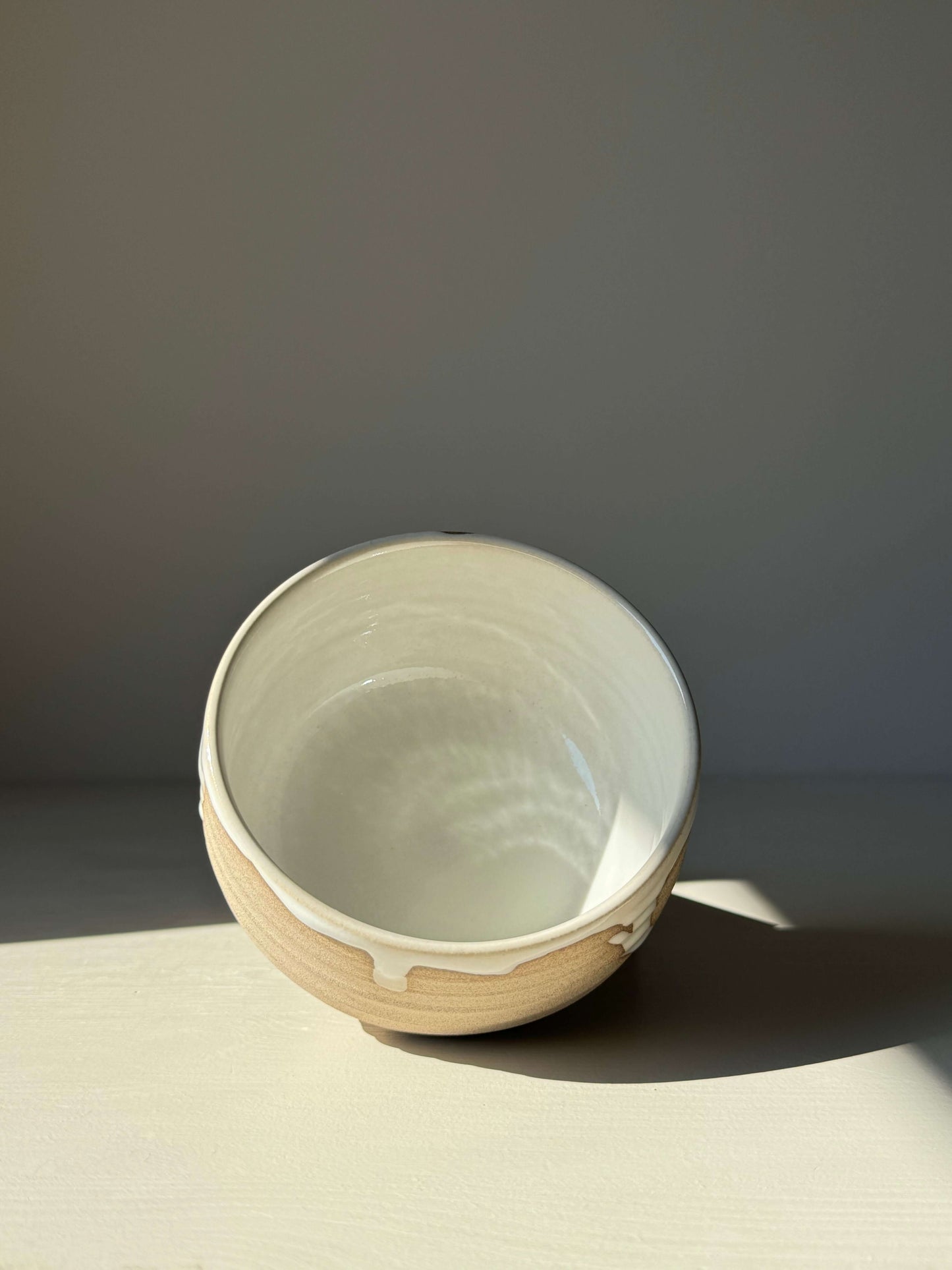 Handmade Matcha Bowl from Yuki Series #07 with toffee clay base and glossy white glaze, perfect for daily rituals.