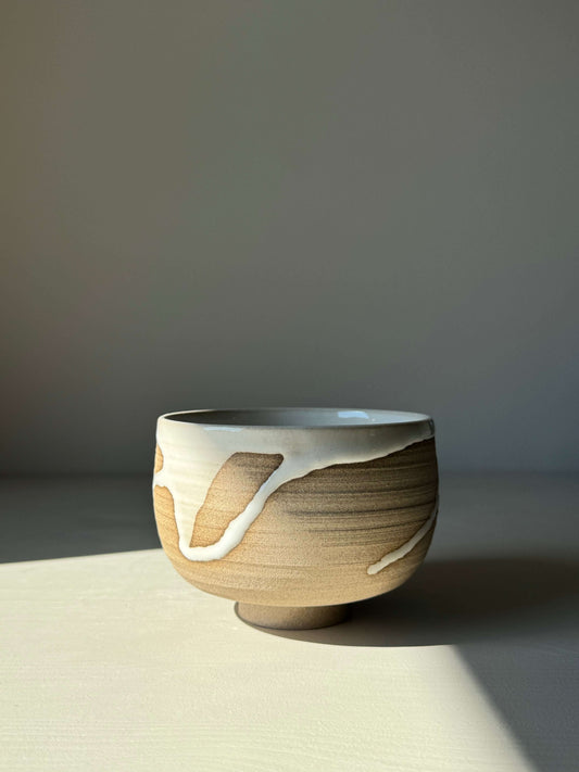 Yuki Series #03 handmade matcha bowl with toffee clay and white glaze, highlighting unique handcrafted design.