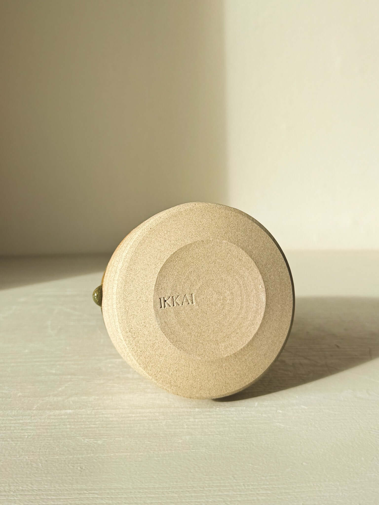 Base of Textured Ceramic Tree – Inyo #01 showing natural throwing lines and tenmoku glaze detail.