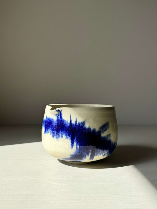 Katakuchi matcha bowl with spout featuring bold cobalt blue glaze, part of the Gosu Series, showcasing dynamic, unrepeatable patterns.
