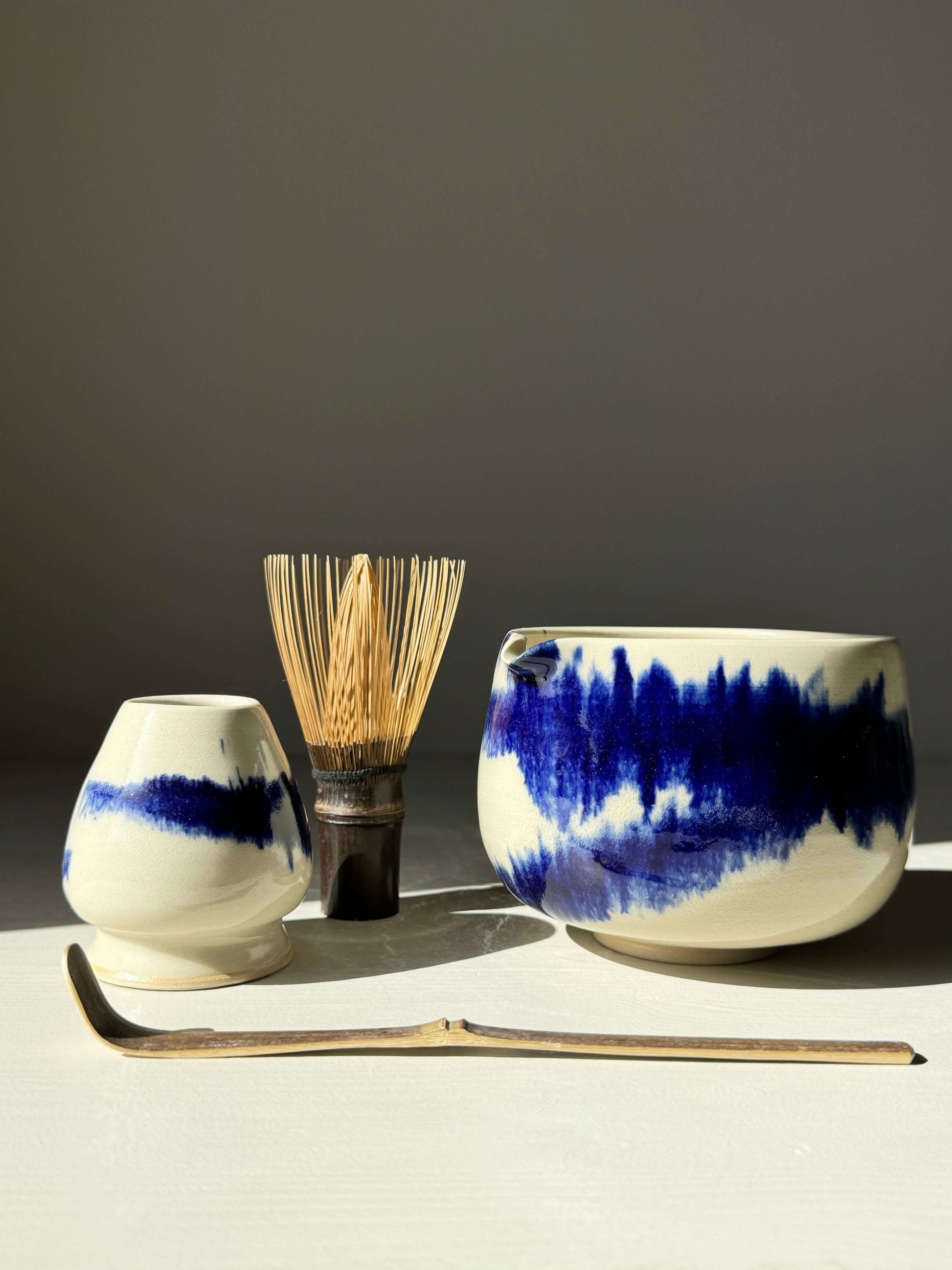 Katakuchi Matcha Bowl with Spout in cobalt blue, part of Gosu Series, featuring traditional Japanese design and dynamic glaze patterns.