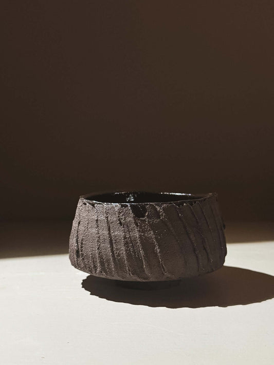 Kuro Matcha Bowl #03 with textured dark brown slip and glossy interior, inspired by volcanic stone and earthy tones.