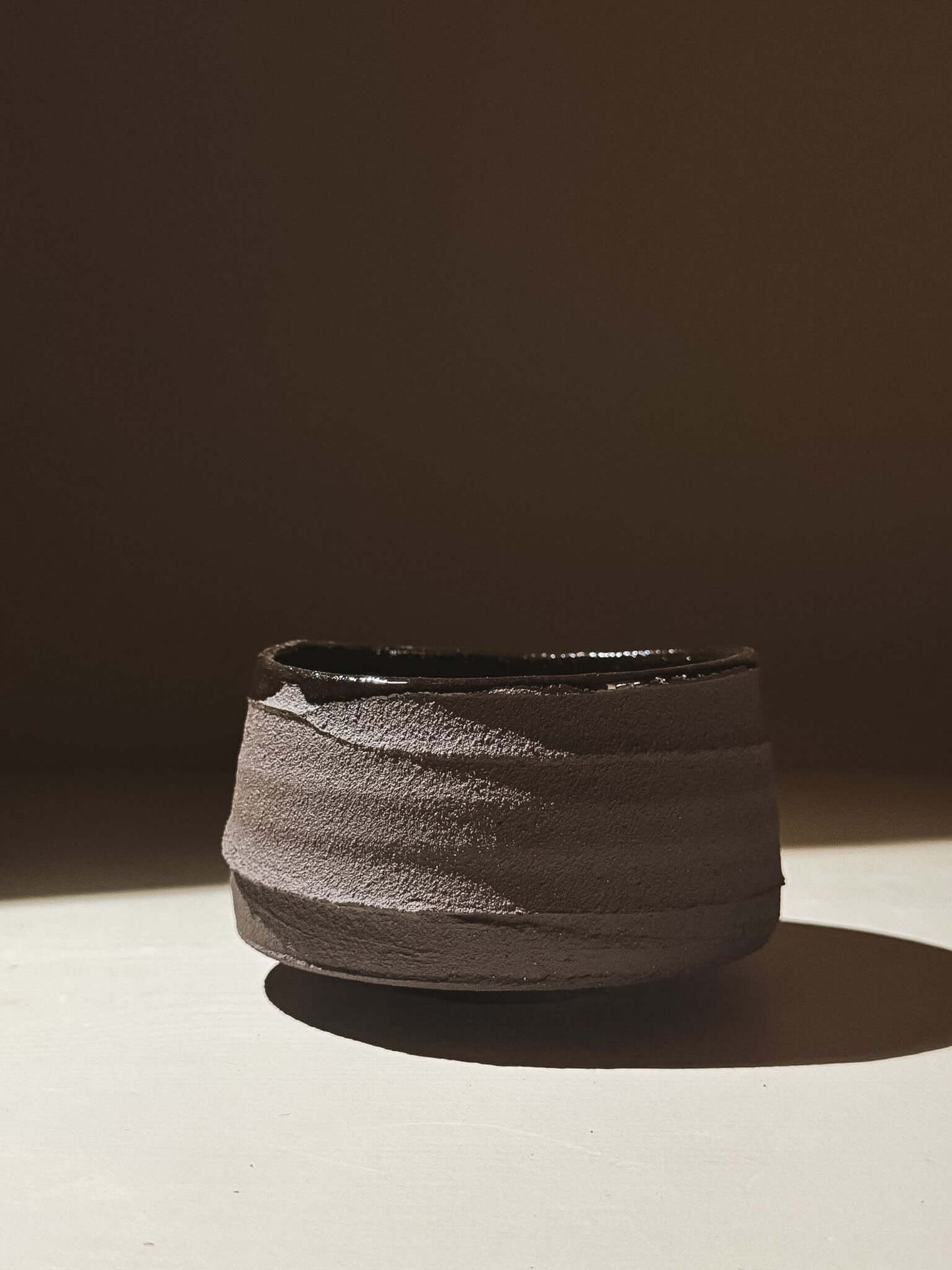 Kuro Matcha Bowl #10 with dark textured exterior and glossy interior