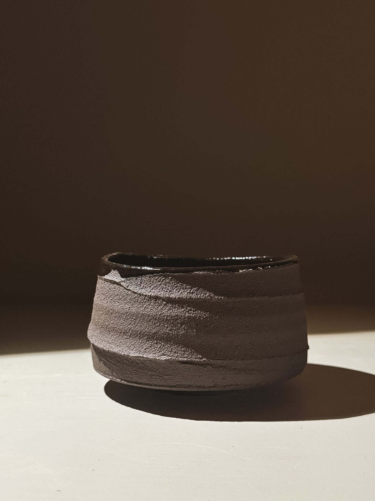 Kuro Matcha Bowl #10 with dark textured exterior and glossy interior
