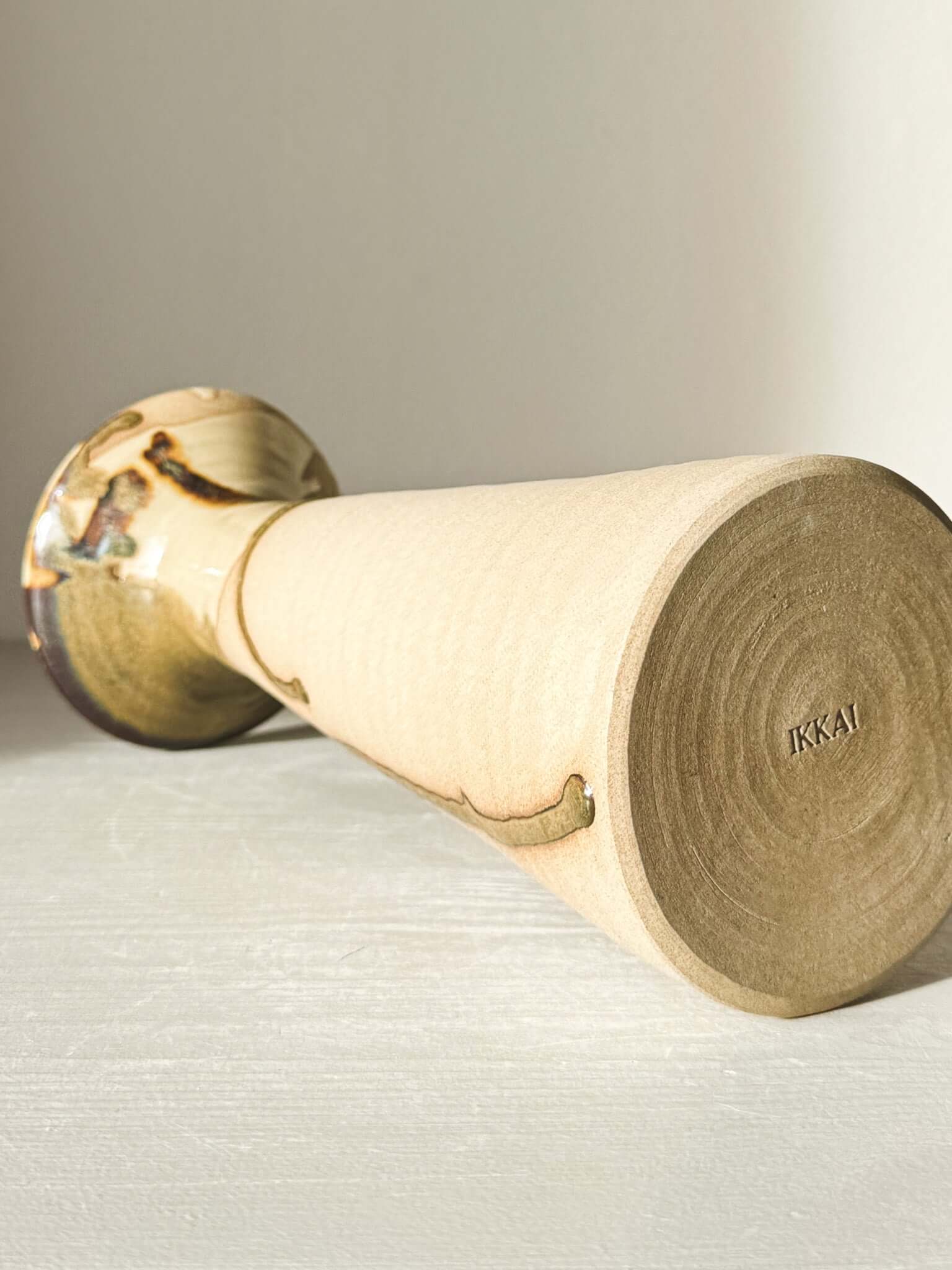 Large Vase – Inyo Series #01 with glossy tenmoku glaze and raw toffee clay base, showcasing a bold, tapered design.