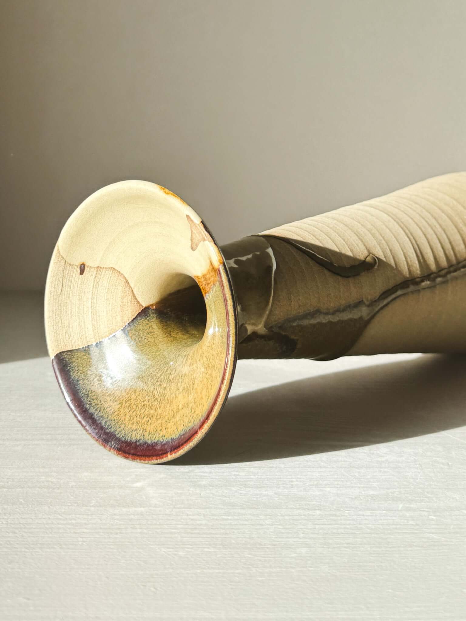 Large Vase – Inyo Series #01 with glossy tenmoku and clear glaze, showing deep browns and soft greens on a toffee clay base.