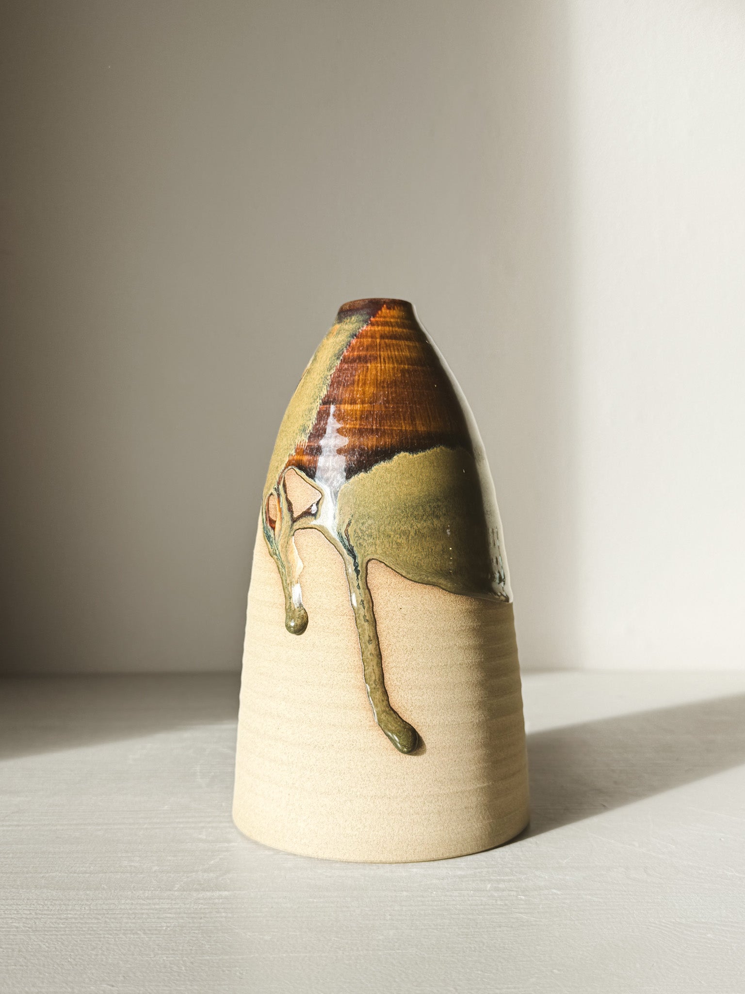 Large Vase – Inyo Series #02 in deep browns and mossy greens glaze with natural movement over warm raw clay, tall and rounded shape.