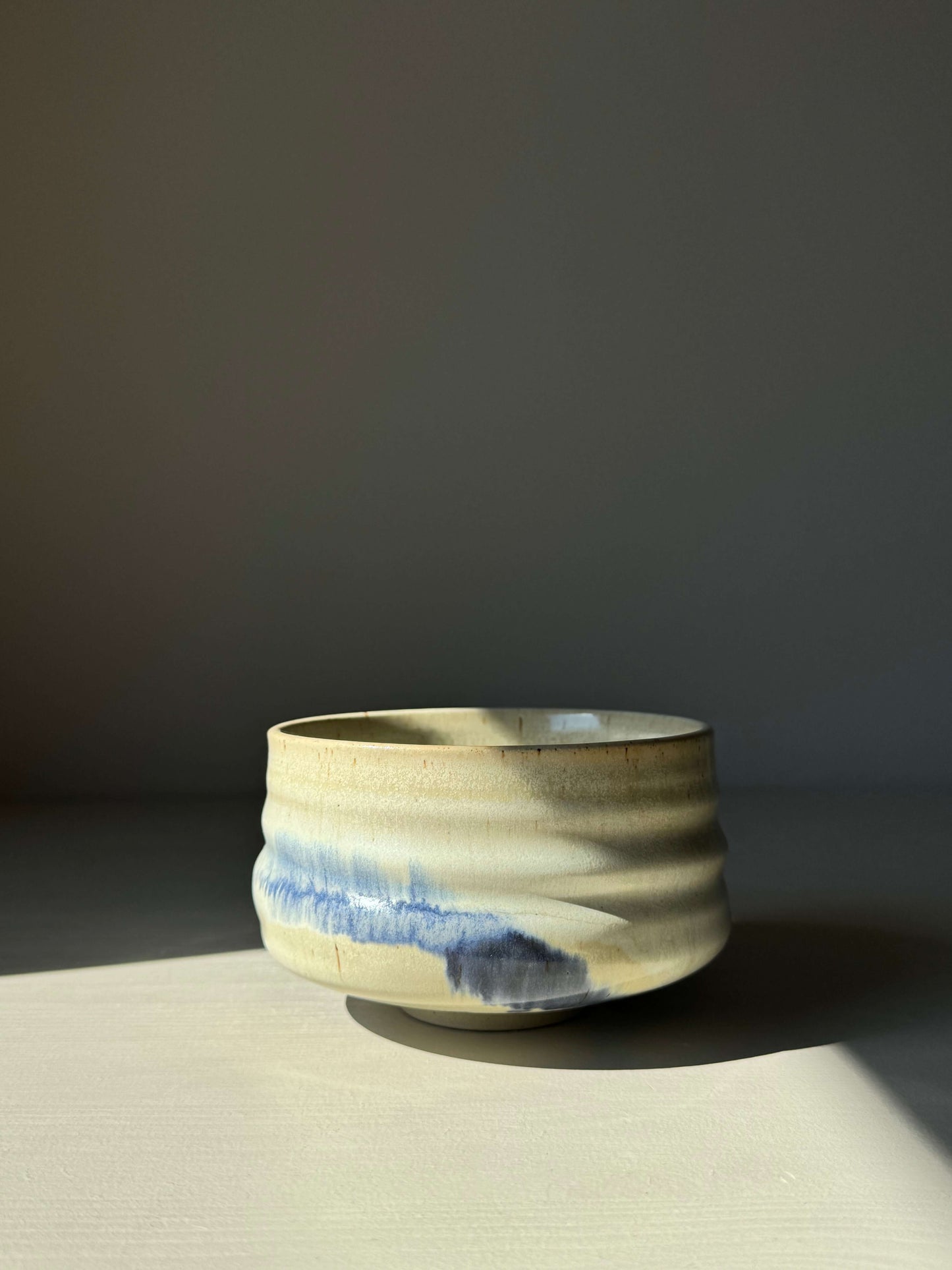 Cobalt Blue & Moonstone Glaze Matcha bowl with unique hand-splashed design, showcasing rounded shape in natural glaze finish.