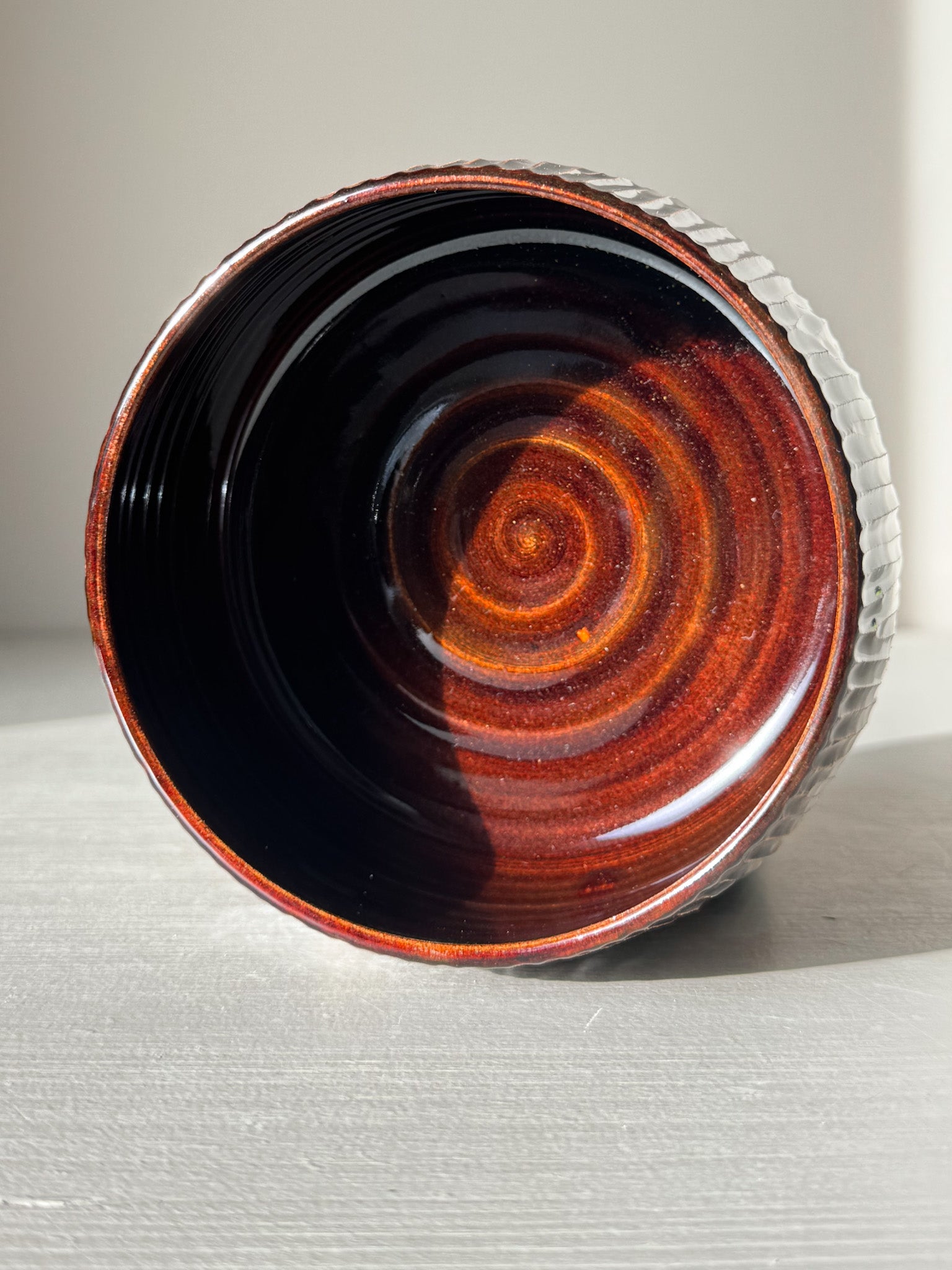 Matcha Bowl – Kinsei #02 with hand-carved vertical lines and rich glossy swirl inside against a light background.