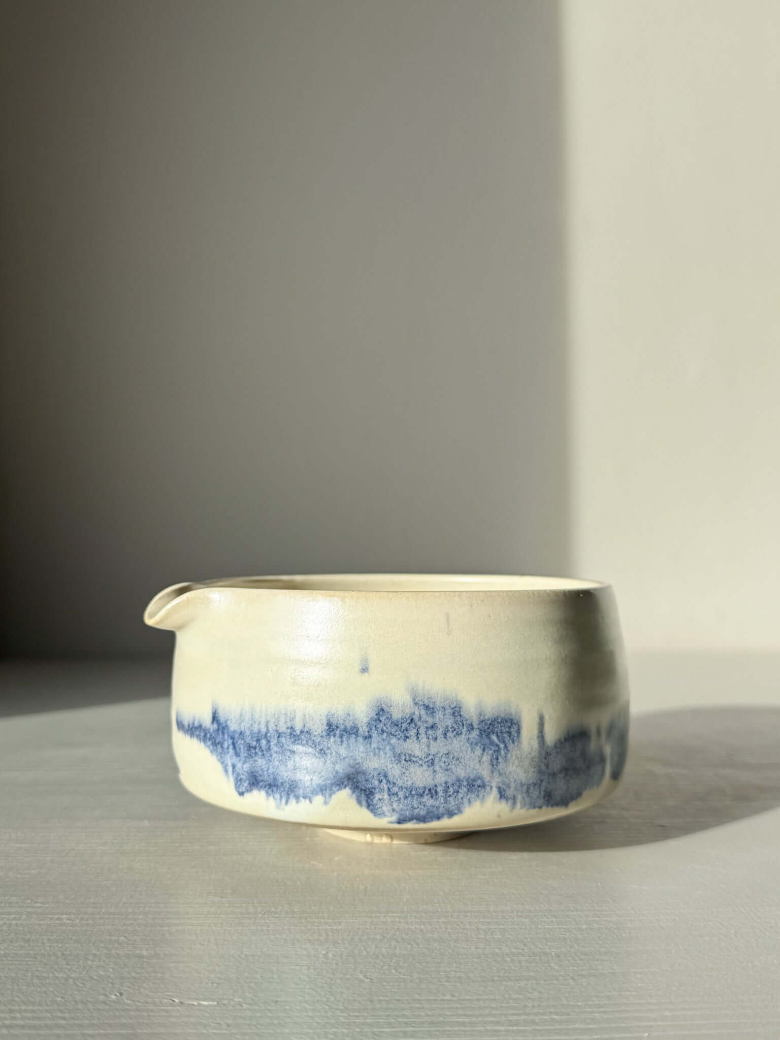 Matcha bowl Spout - Moonstone & Blue #02 with hand-splashed cobalt glazes and silky moonstone finish, perfect for daily tea rituals.