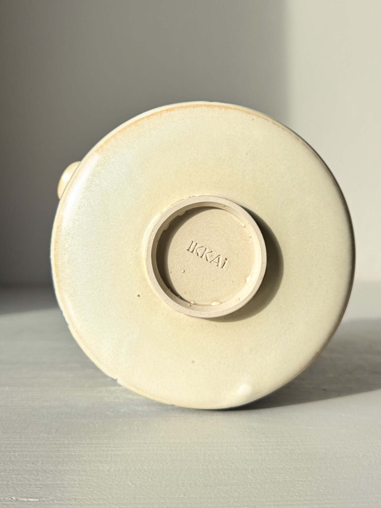 Base of Matcha bowl Spout - Moonstone & Blue #02, showcasing delicate craftsmanship and smooth moonstone glaze finish.