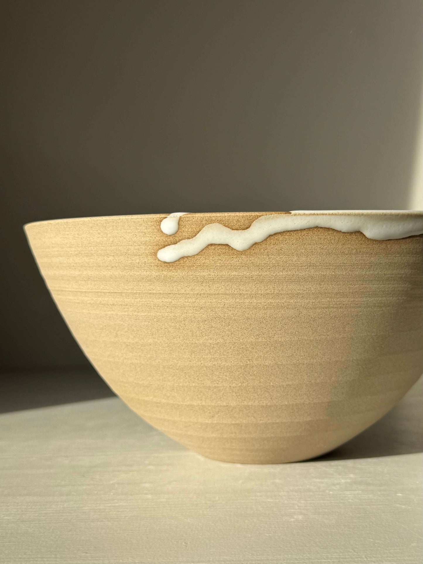 Medium Bowl - Yuki #02, handmade ceramic with glossy white glaze over toffee clay, ideal for tabletop centerpieces.