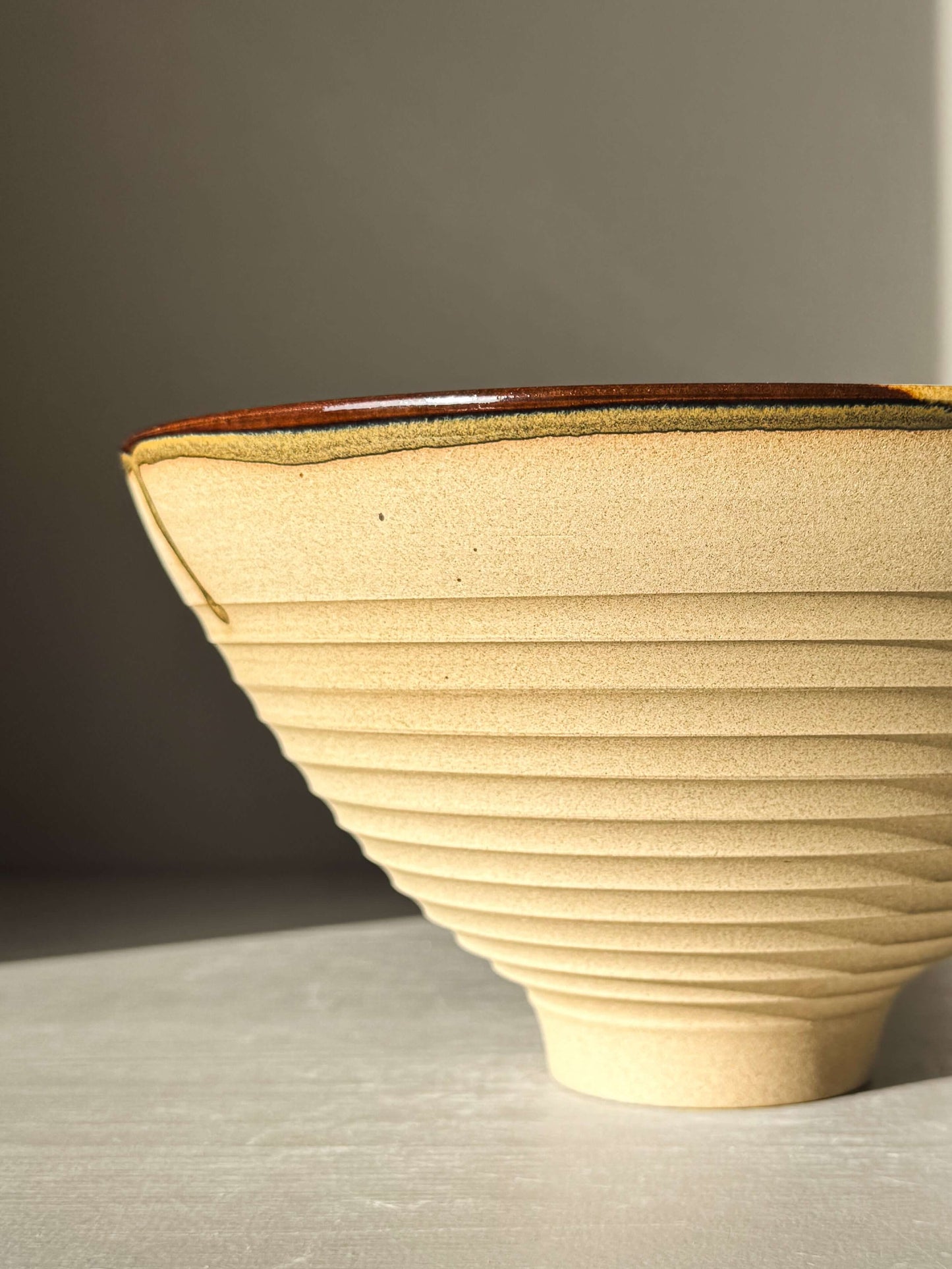 Medium Carved Bowl - Inyo #01 with textured exterior and colorful interior design.