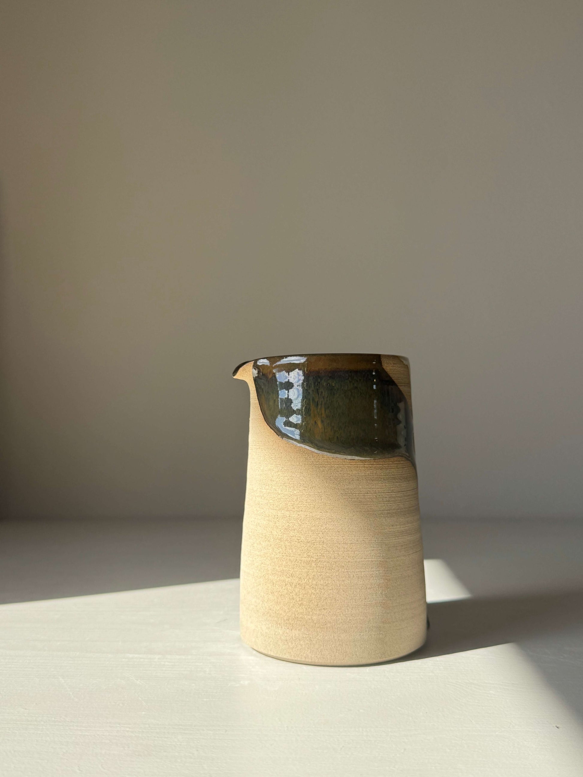 Medium Vase / Jug – Inyo Series with handmade ceramic glaze and sculptural design on display.