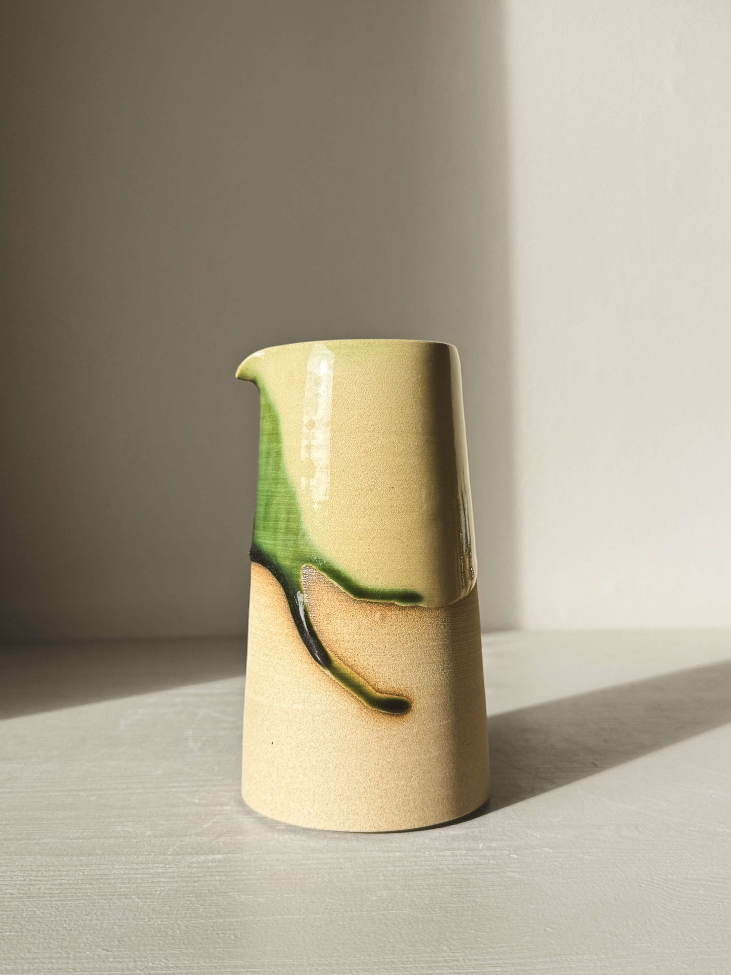 Medium Vase/Jug – Mori #02 with rounded form, green glossy glaze, showcasing natural toffee clay base, ideal for home decor.