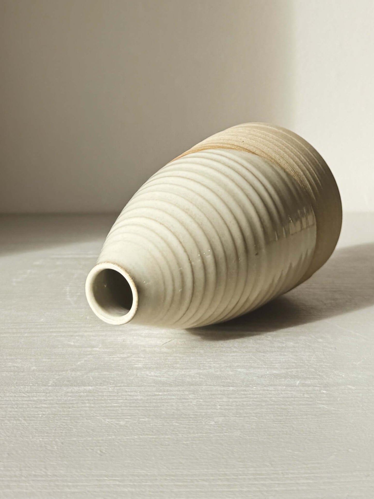 Medium Vase – Yuki #03, tall rounded ceramic vase with white glaze and narrow opening, elegant home decor accent piece.