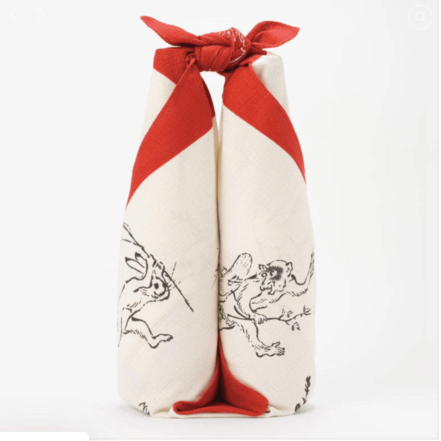 Medium Furoshiki Round Window Red with Choju Jinbutsu Giga motifs featuring animals like rabbits, frogs, and monkeys, wrapped elegantly.