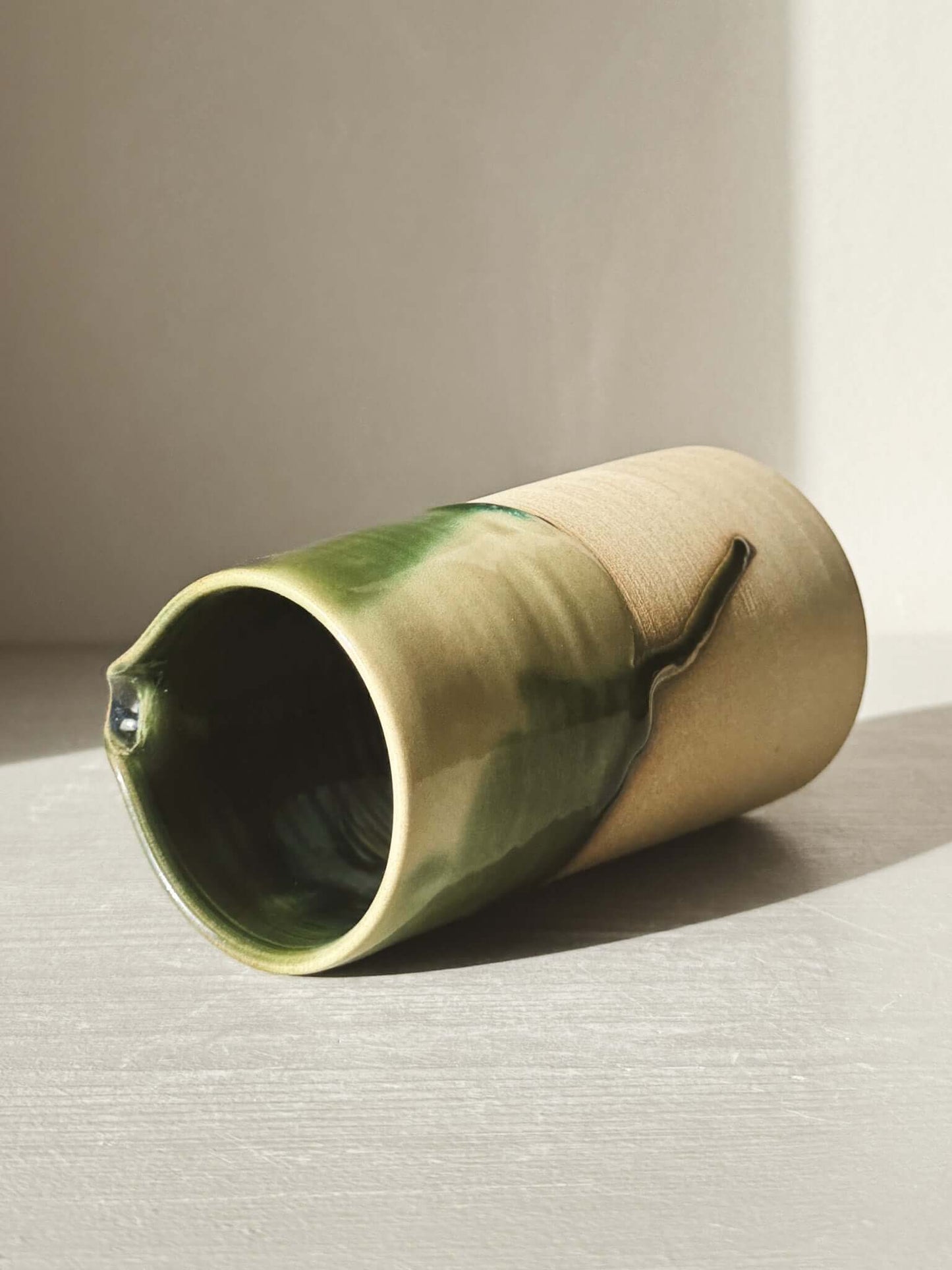 Medium Vase/Jug – Mori #01 with glossy green glaze and toffee clay base, showcasing its natural, sculptural design.