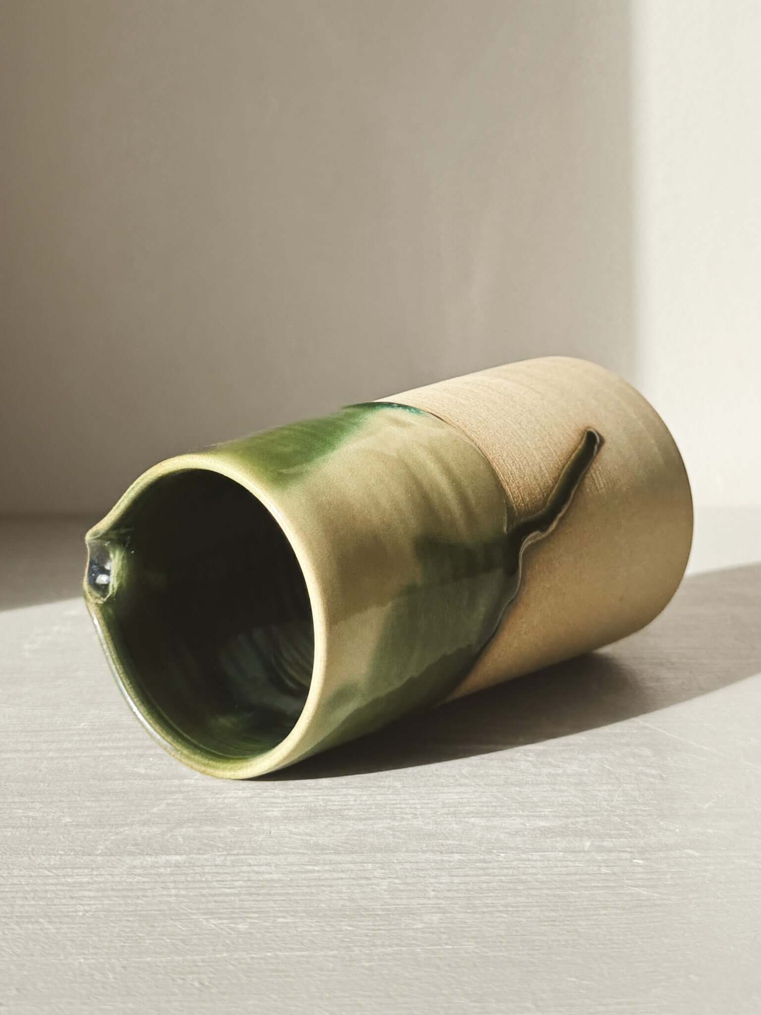 Medium Vase/Jug – Mori #01 with glossy green glaze and toffee clay base, showcasing its natural, sculptural design.