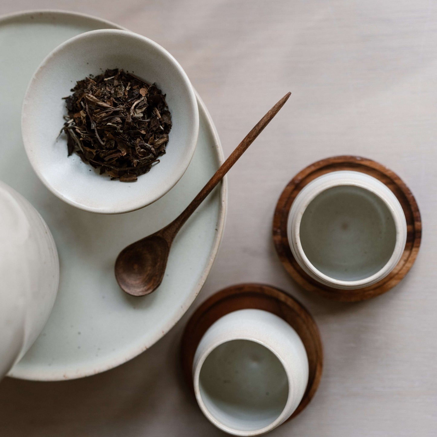 Medium Walnut Wooden Spoons with handmade ceramic cups and saucers