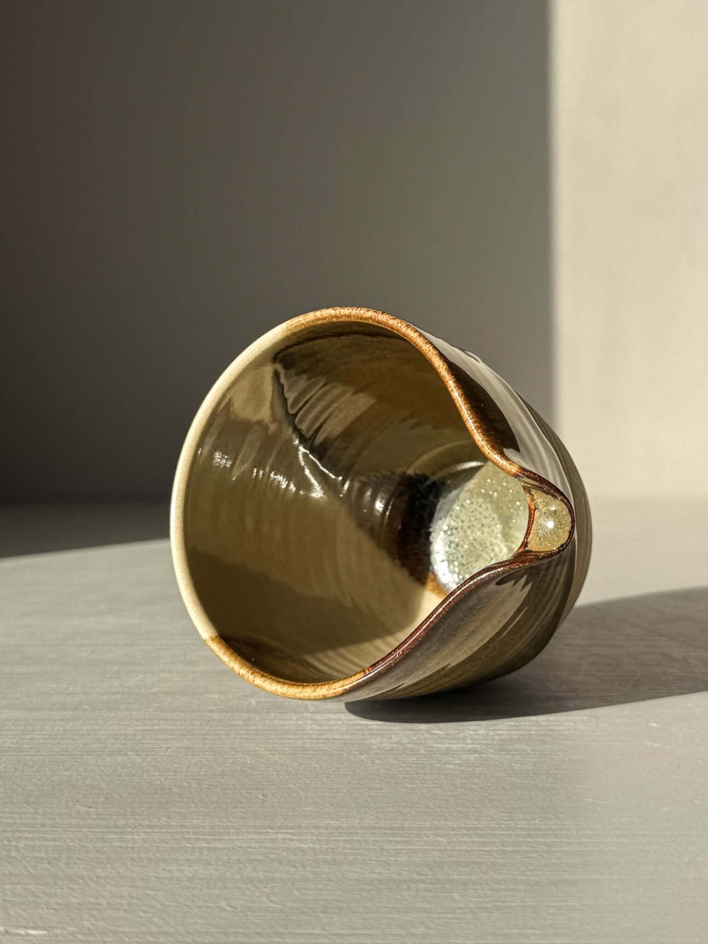 Handmade ceramic Pouring Jug – Inyo Series #01 with glossy tenmoku and clear glaze design, perfect for sauces or milk.