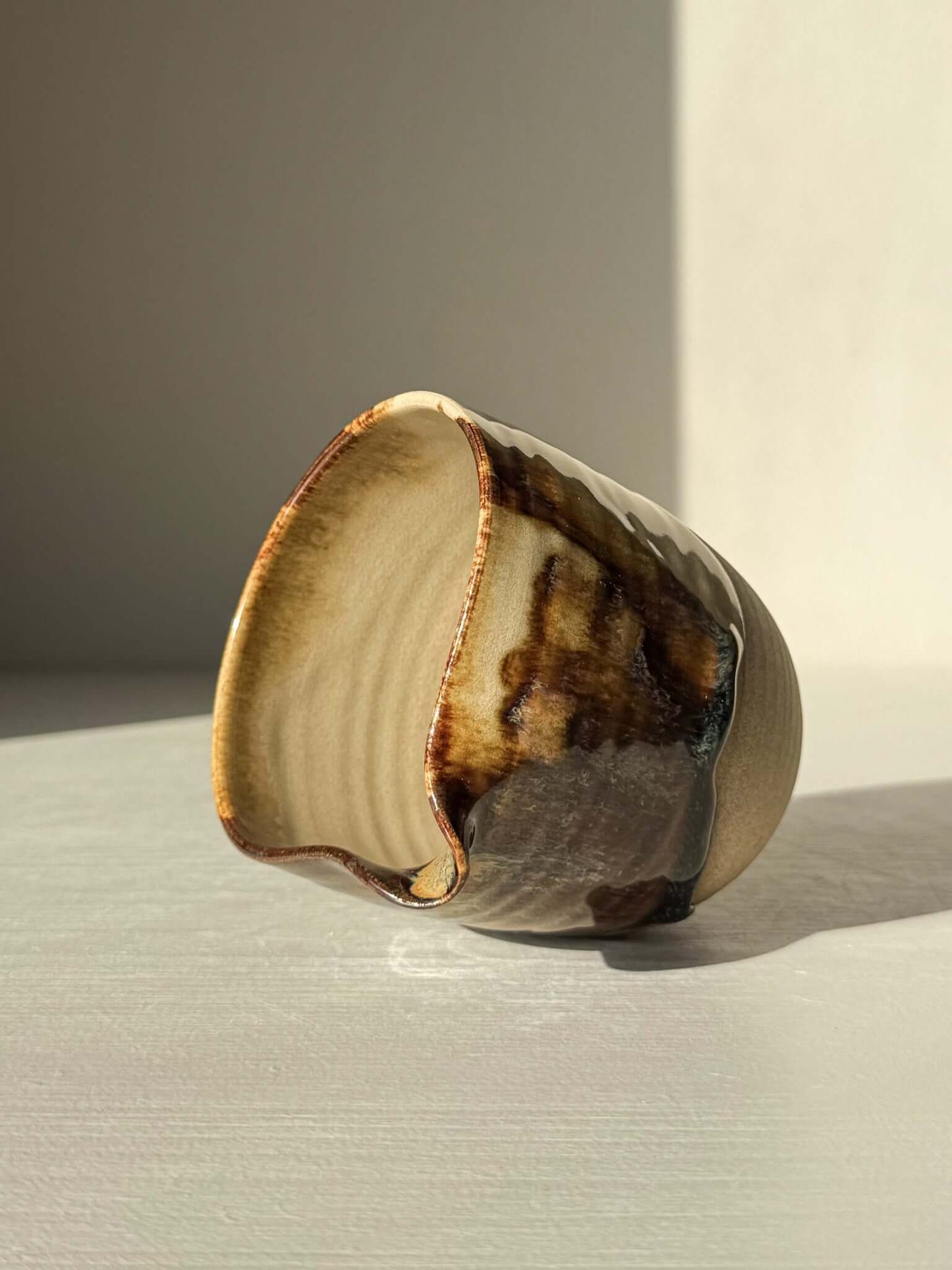 Handmade ceramic Pouring Jug – Inyo Series #02 with glossy tenmoku and clear glaze over toffee clay, perfect for warm sauces or milk.