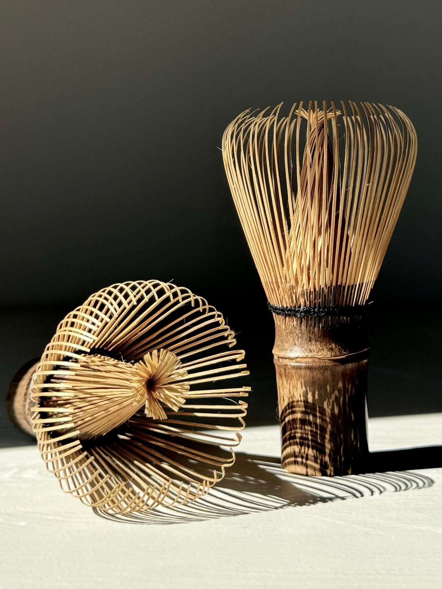 Premium Takayama Chasen dark bamboo matcha whisk with 70 struts, ideal for creating smooth, creamy froth in your matcha tea.