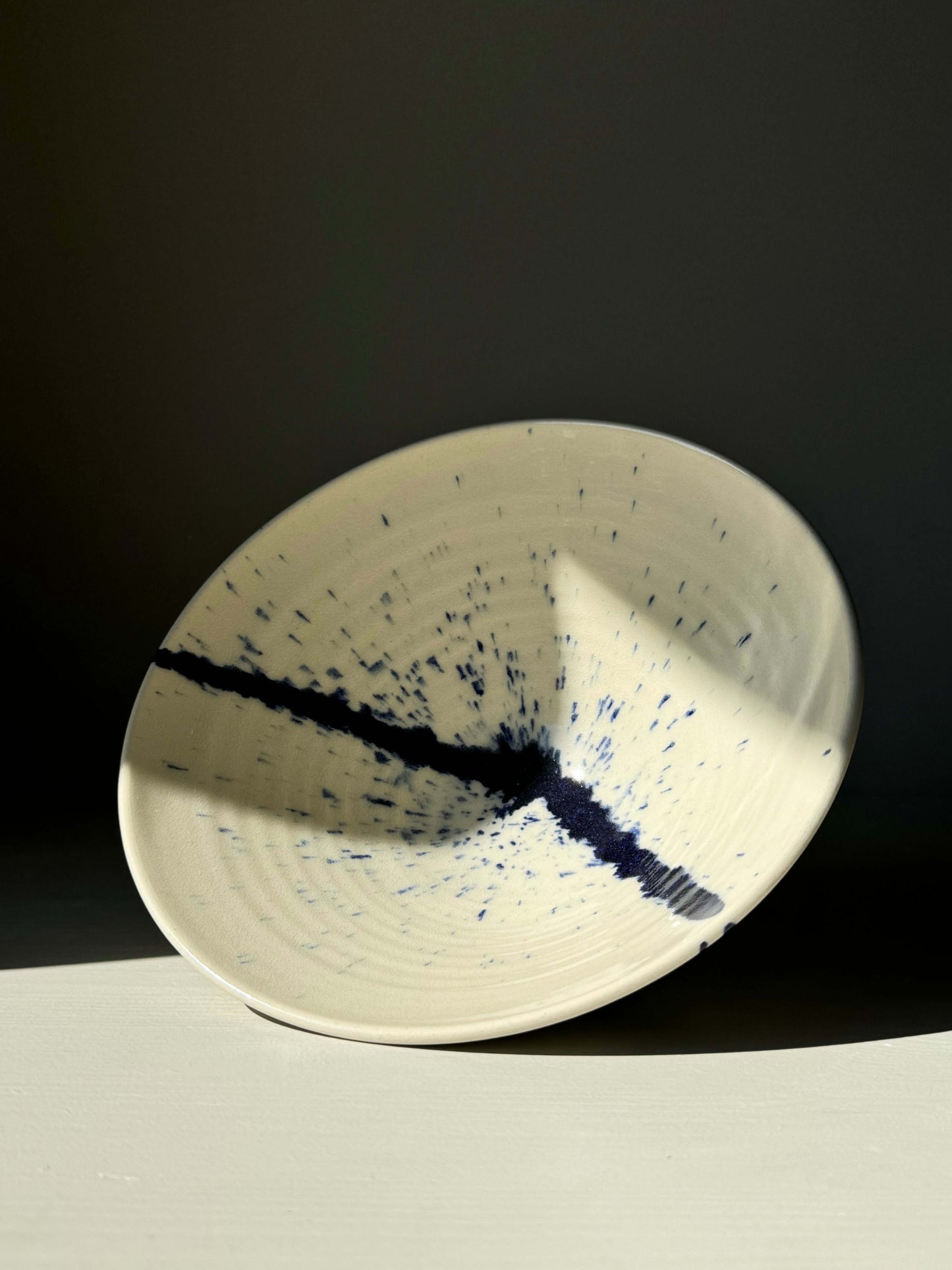 Gosu Series Ramen Bowl with cobalt splash design, inspired by Japanese aesthetics, on a neutral background.