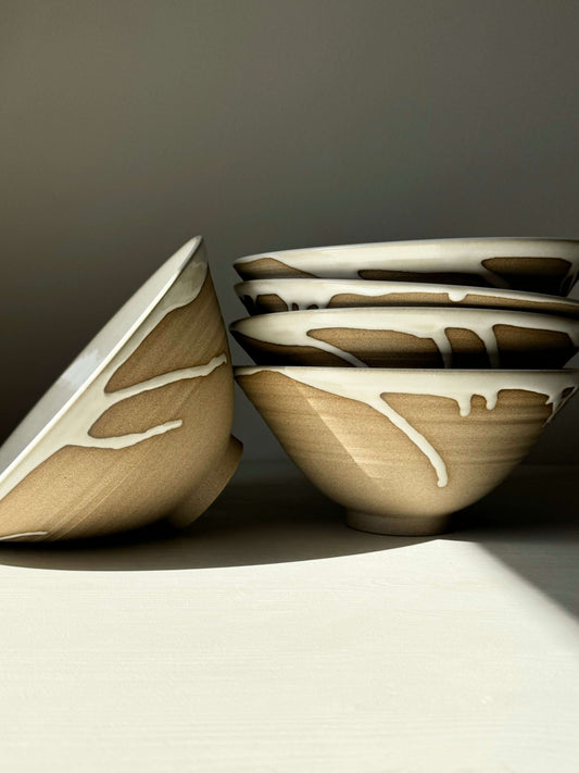 Yuki Series Ramen Bowl with glossy white glaze and raw toffee clay, showcasing elegant and functional design with gentle curves.