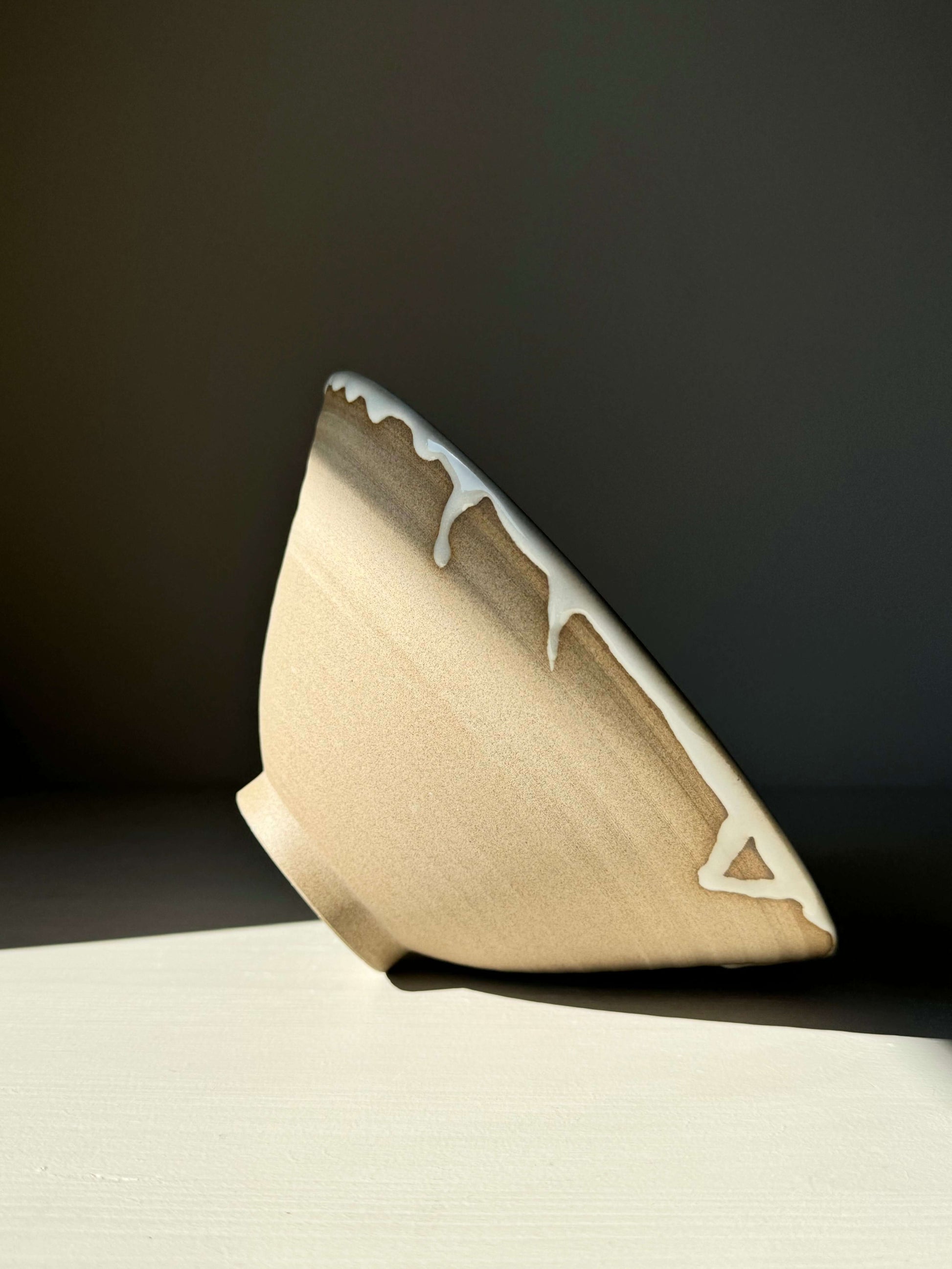 Yuki Series ramen bowl with raw toffee clay and glossy white glaze, featuring a rounded shape for elegance and functionality.