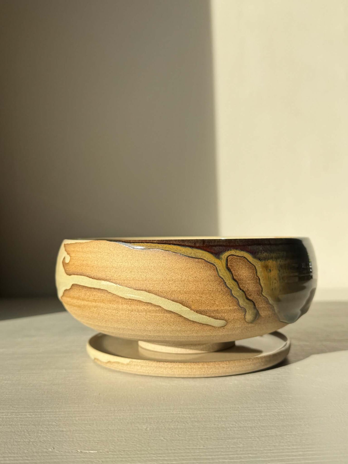 Rounded Berry Bowl - Inyo #02 with drip plate on a light background.