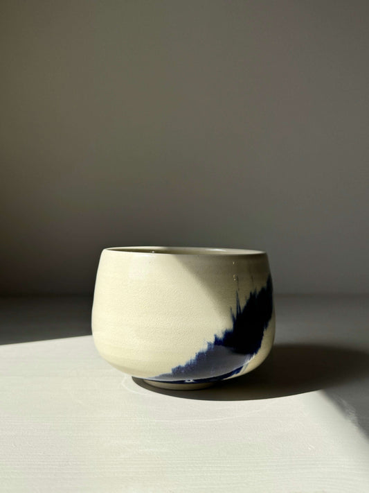 Rounded Matcha Bowl from Gosu Series with cobalt glaze band, reflecting nature-inspired design and rounded shape.
