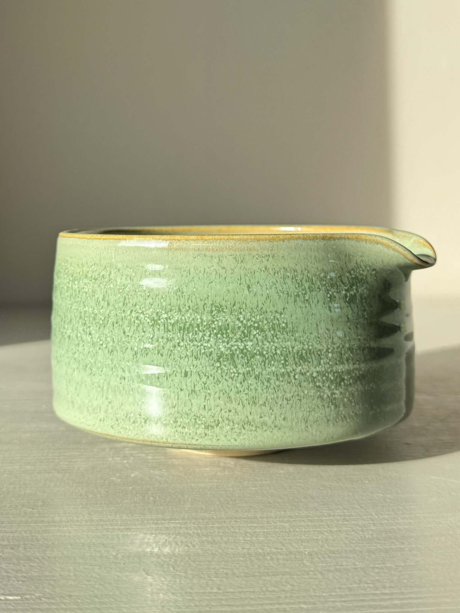 Matcha Bowl Spout – Sage #01 with soft sage-green glaze and open form design, ideal for whisking matcha into a smooth blend.