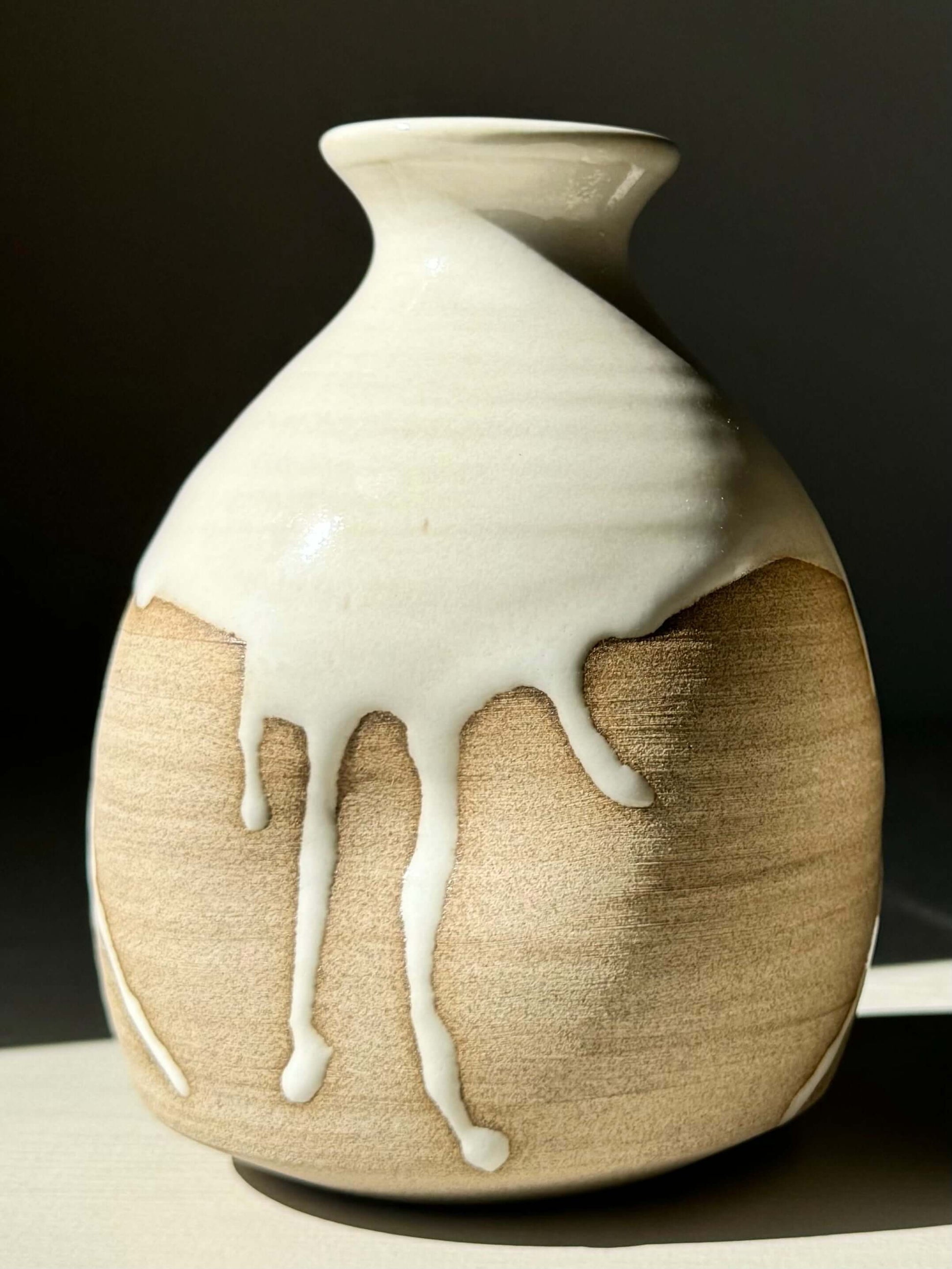 Yuki Series sake bottle with toffee clay and soft white glaze, designed for everyday enjoyment and easy pouring, 13.5 cm tall.