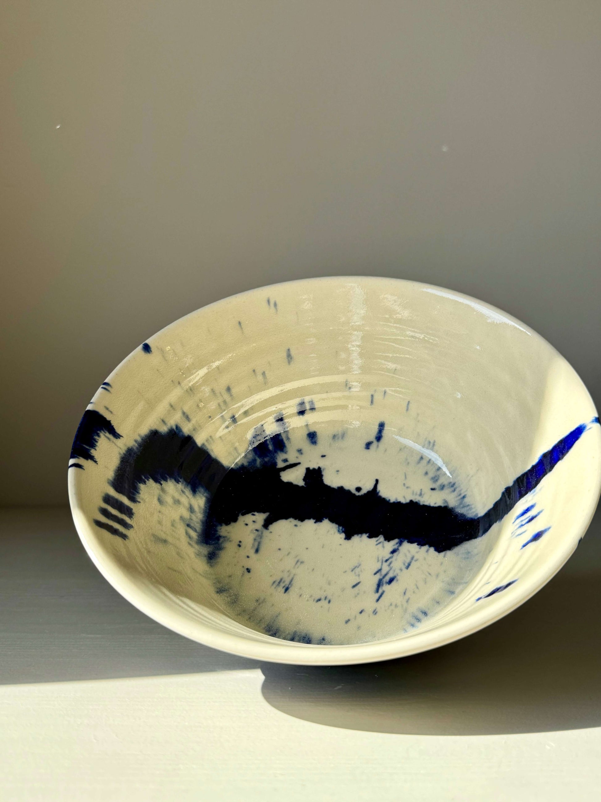 Gosu Series #03 serving bowl with blue abstract pattern, inspired by Japanese design, featuring a clean, elevated shape.