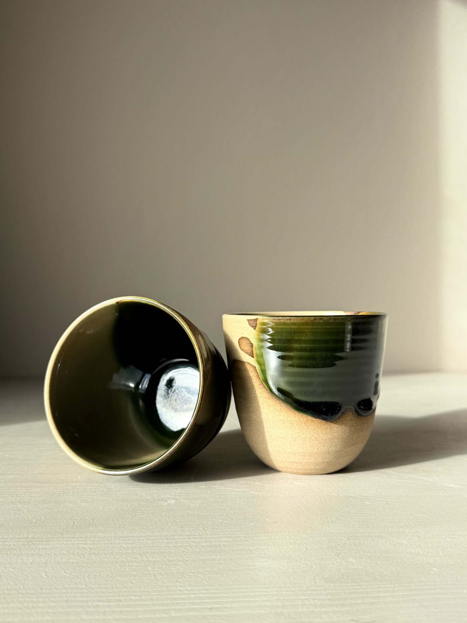 Stackable Latte Cups - Mori with green and clear glaze on stoneware, showcasing handmade design and stackability for everyday use.