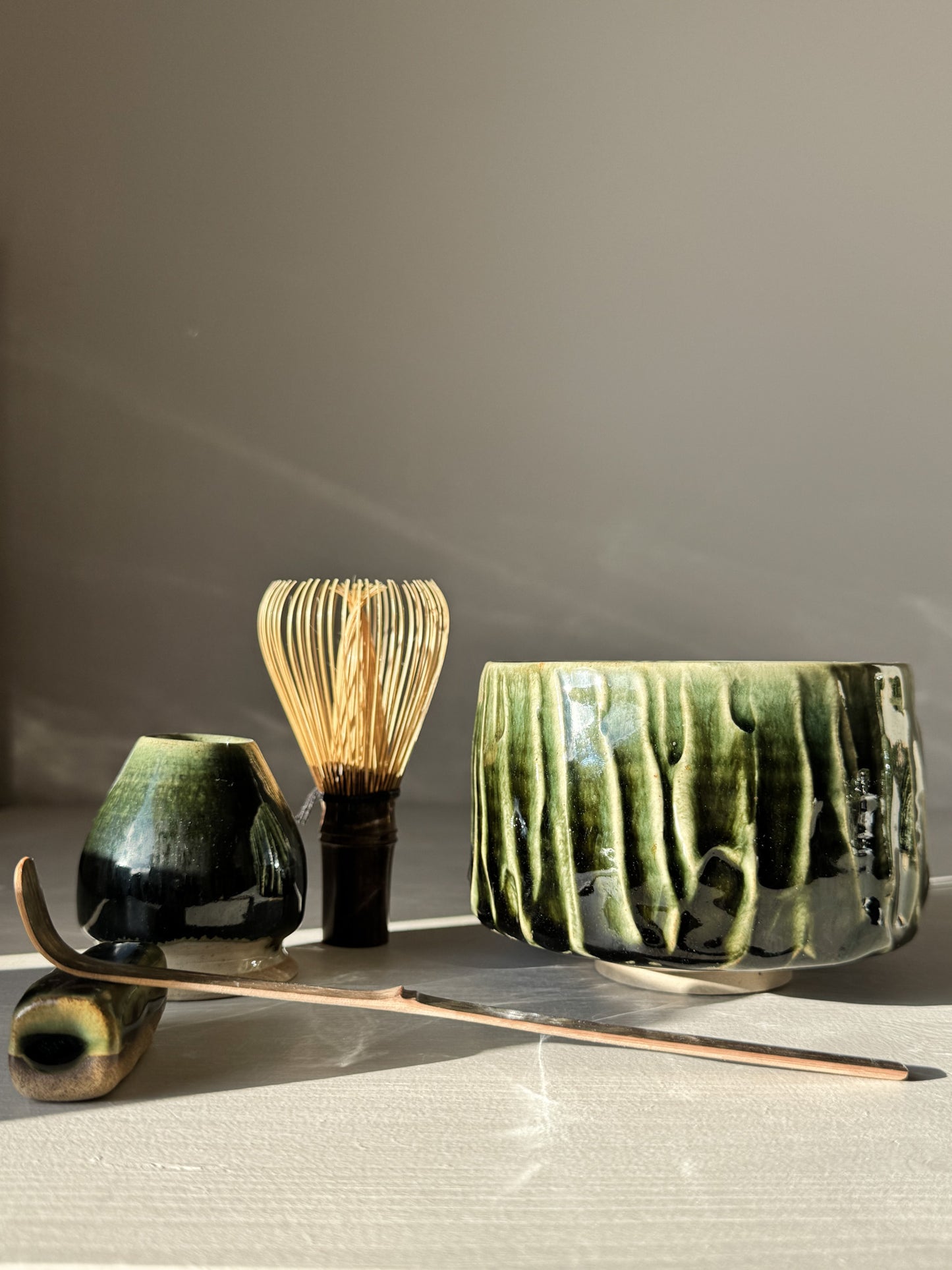 Textured Matcha Bowl - Hinoki #07 with green glaze, whisk, and scoop for matcha ritual