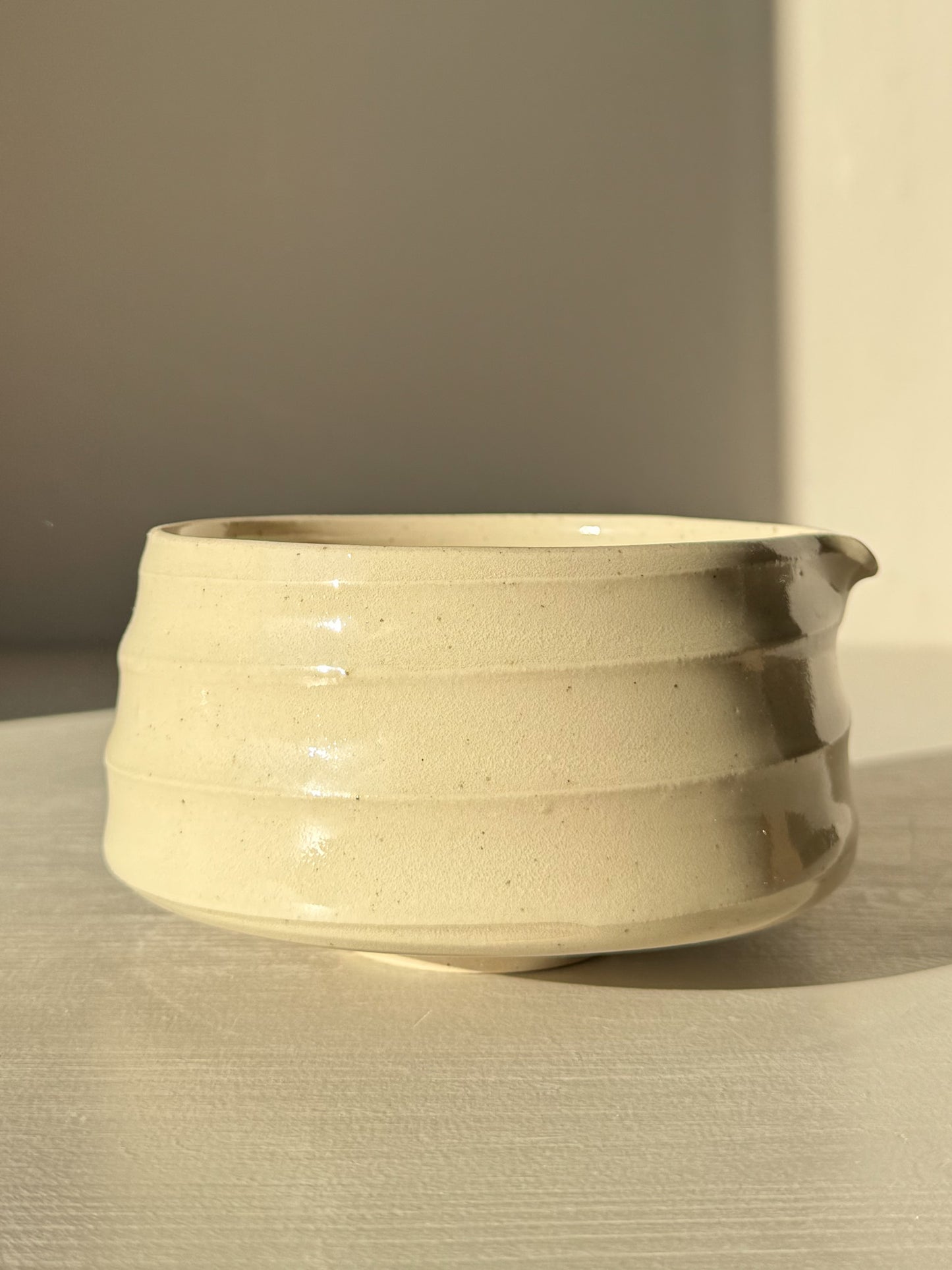 Textured Matcha Bowl Spout - Clear #01 with glossy glaze showcasing throwing lines and clay texture.
