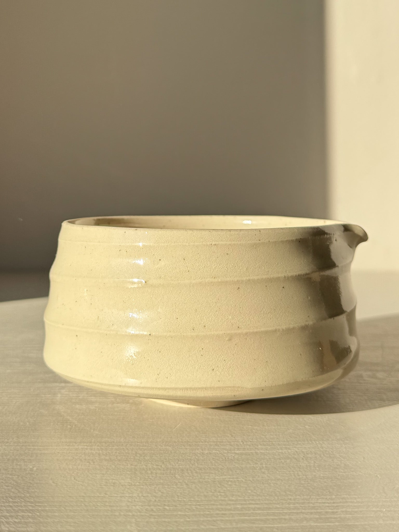 Textured Matcha Bowl Spout - Clear #01 with glossy glaze showcasing throwing lines and clay texture.