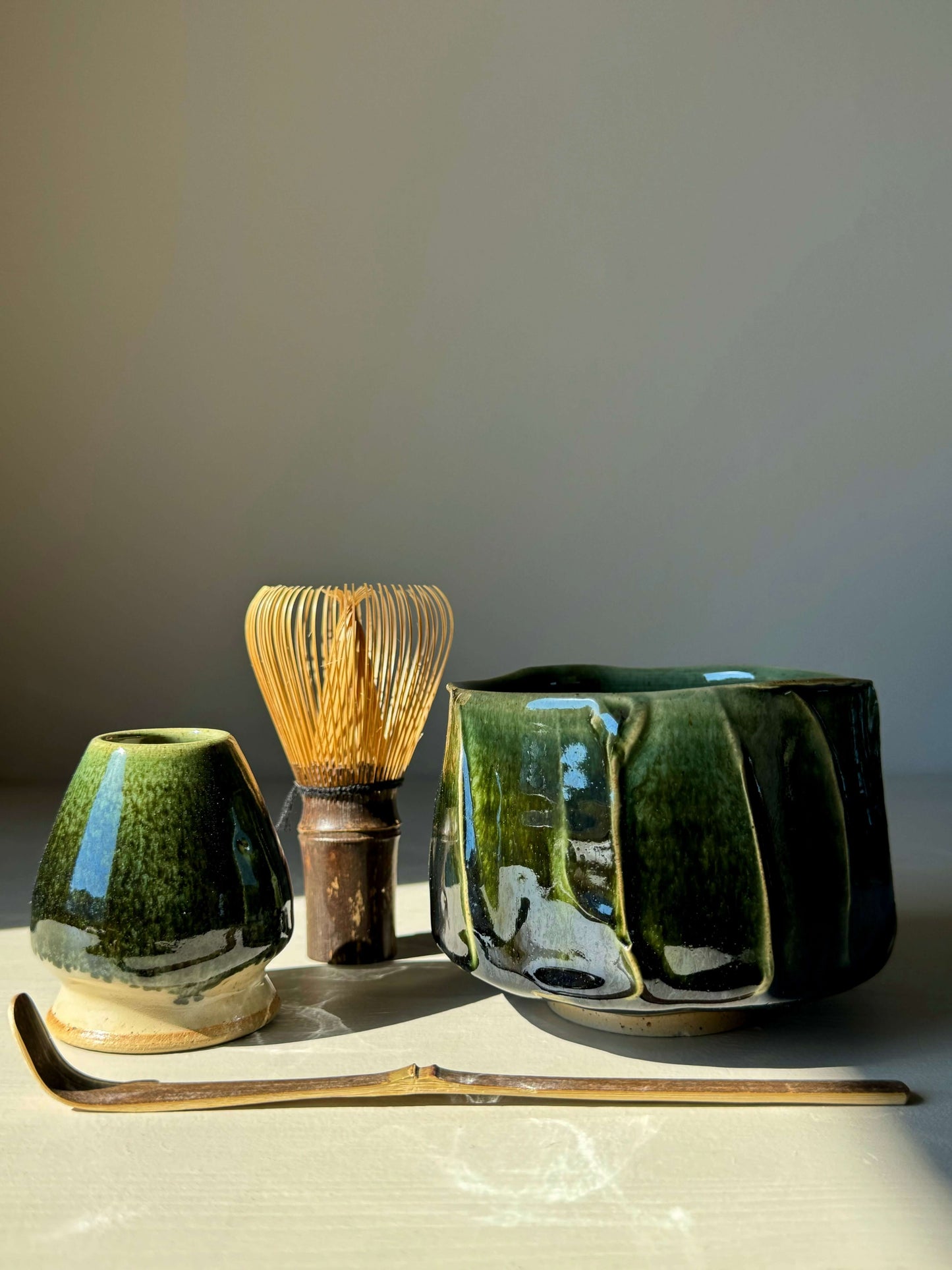 Textured Matcha Bowl from Hinoki Series #01 with whisk and scoop, featuring green glaze and natural finish, perfect for tea rituals.