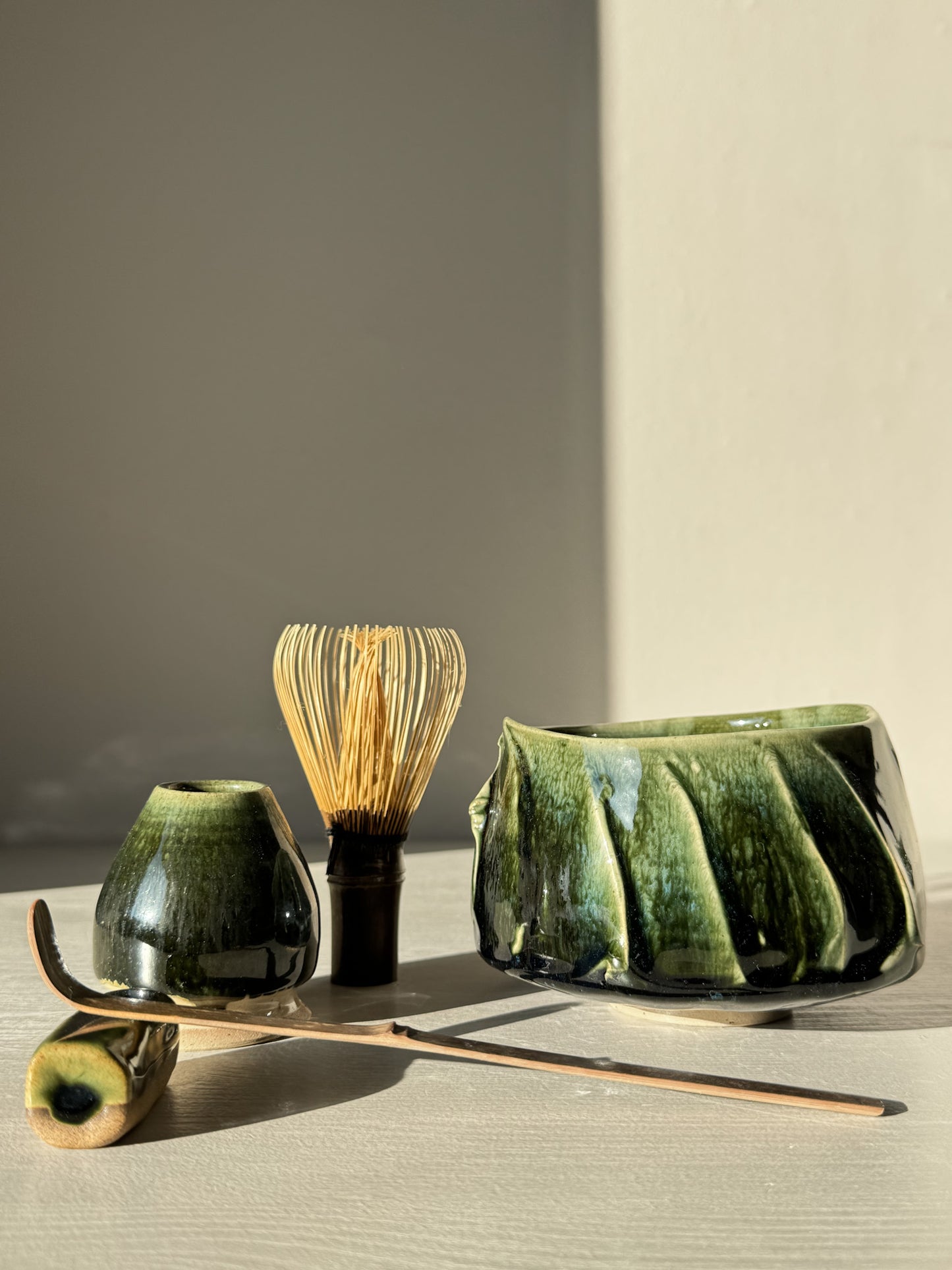 Textured Matcha Bowl - Hinoki #11 with green glaze and textured finish alongside traditional tea tools