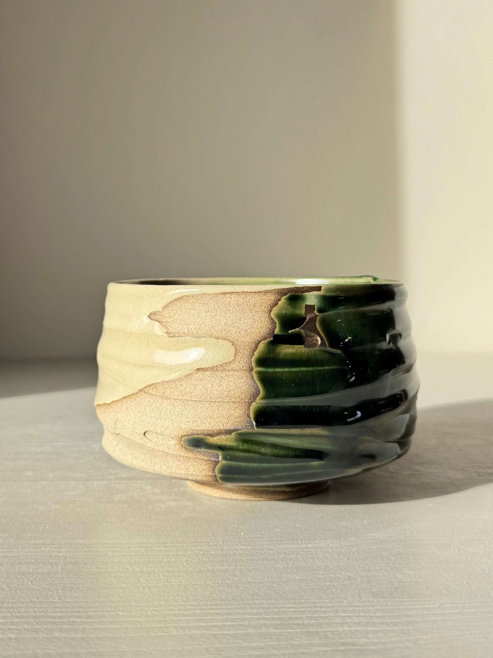 Textured Matcha Bowl – Mori #01 handmade ceramic with organic surface and forest-green glaze highlighting natural design.