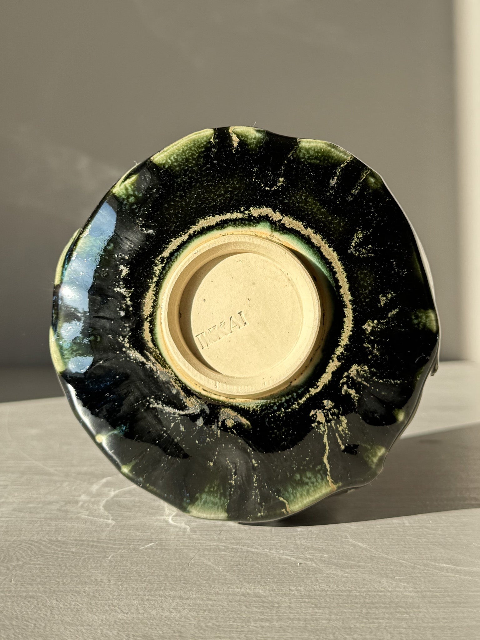 Bottom view of Textured Matcha Bowl - Hinoki #10 showing green glaze and textured finish for unique design.