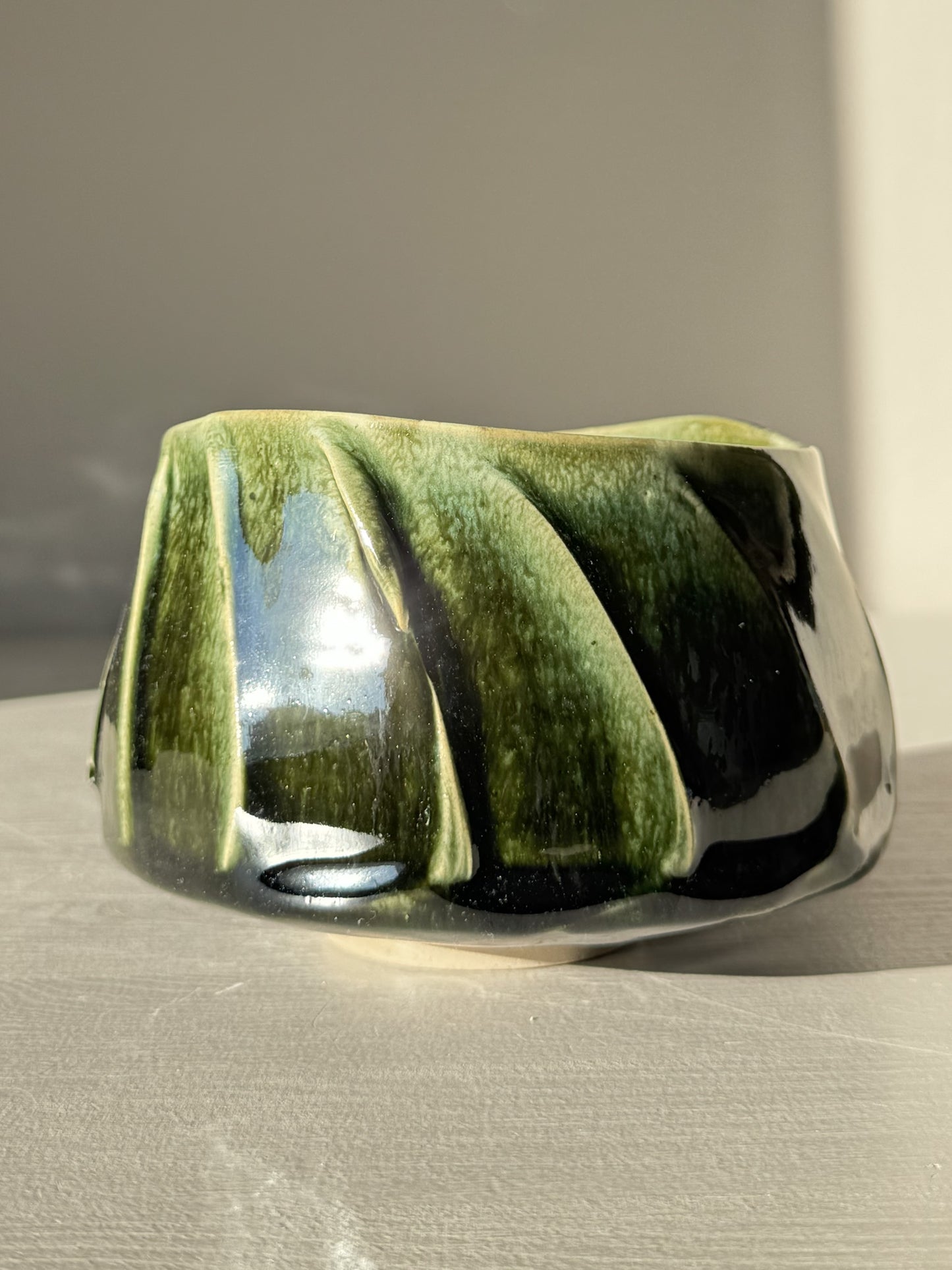 Textured Matcha Bowl - Hinoki #11 with green glaze and textured finish in sunlight, part of the calming Hinoki Series collection.