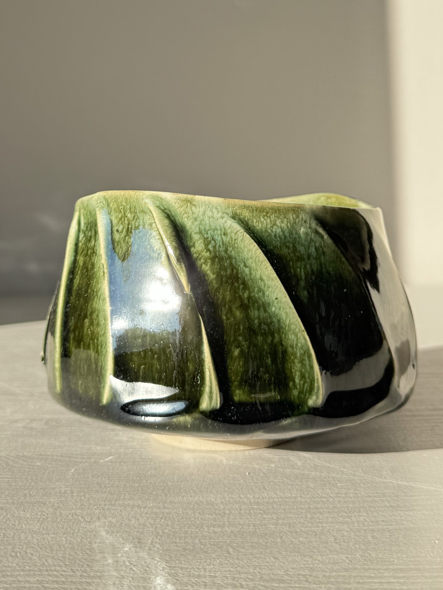 Textured Matcha Bowl - Hinoki #11 with green glaze and textured finish in sunlight, part of the calming Hinoki Series collection.