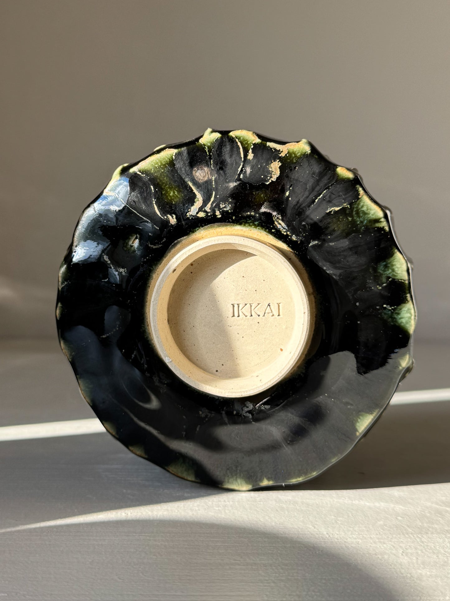 Textured Matcha Bowl - Hinoki #08 with green glaze and textured finish, inspired by the calming hues of the Hinoki tree, underside view