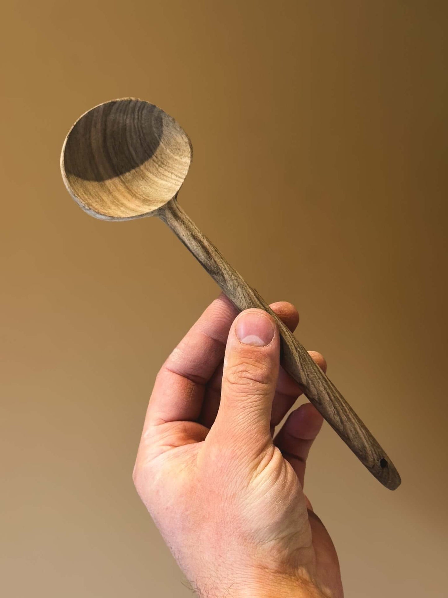 Close up of wooden serving spoons crafted from walnut wood in Marrakech