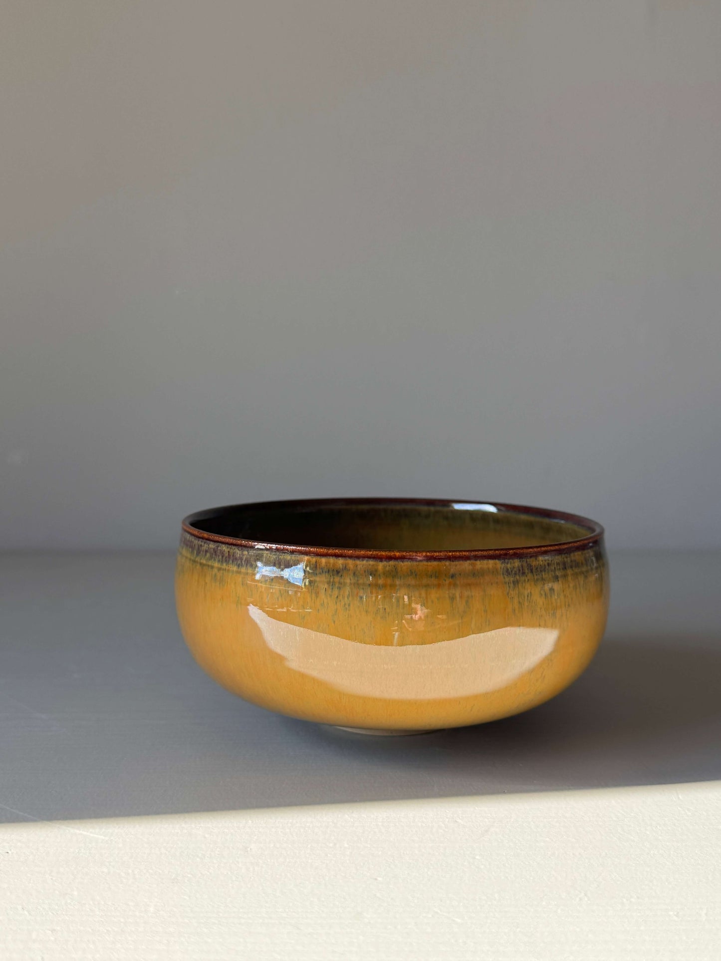 Wide Matcha Bowl – Tenmoku Glaze, handmade ceramic with rich earthy tones and elegant finish, ideal for effortless tea whisking.